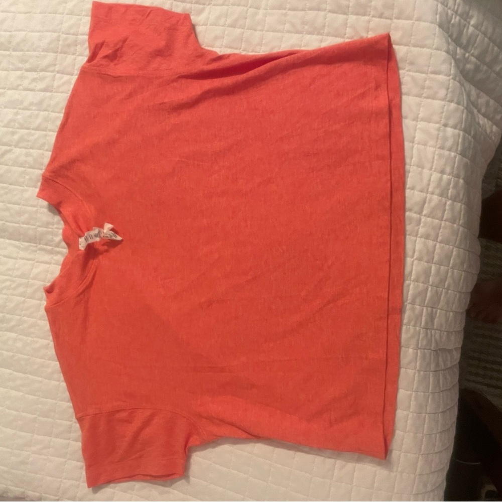 2 lululemon athletica Orange and black Crop Top. Worn once.